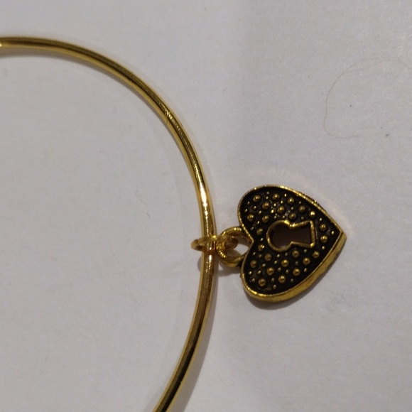 Gold Tone Expandable Bangle Bracelet with Heart Lock Charm – Elegant & Stylish - Picture 4 of 7